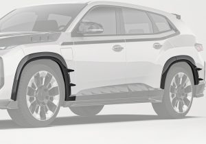 A clear side view displaying the Carbon Fiber Wheel Arches seamlessly integrated into the BMW XM G09, showcasing improved styling