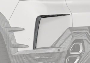 A complete rear-end view of the BMW XM G09, showcasing the seamless integration of the bold Carbon Fiber Rear Canards for added style and aerodynamic precision.