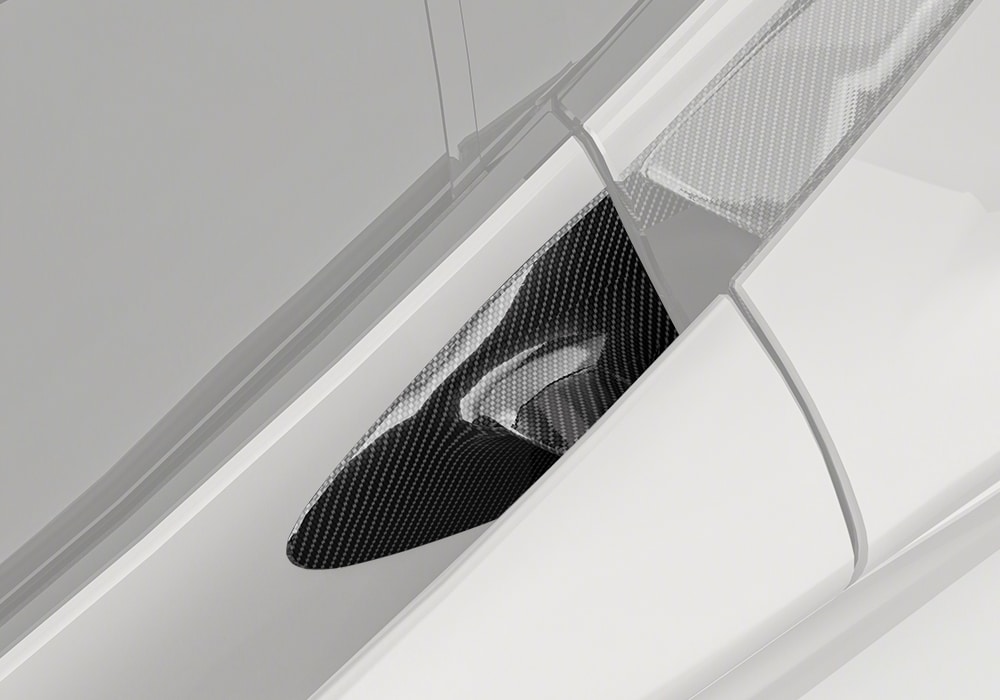 Close-up of McLaren 720S featuring Carbon Fiber Door Handle Trim, showcasing precise fitting and premium material