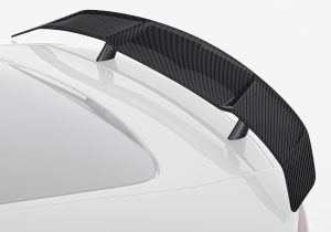 A detailed image showcasing the aerospace-grade carbon fiber texture and the shiny UV-resistant high-gloss finish of the rear spoiler