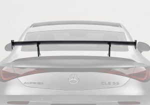 Detailed shot of the 3K twill weave carbon fiber Rear Wing, highlighting the flawless craftsmanship and high-gloss finish