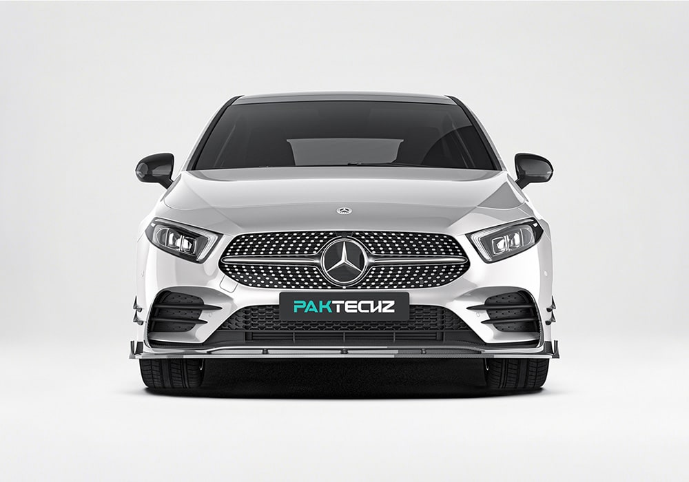 A detailed shot highlighting the bold carbon fiber front splitter, showing its aggressive styling and seamless fit with the factory bumper