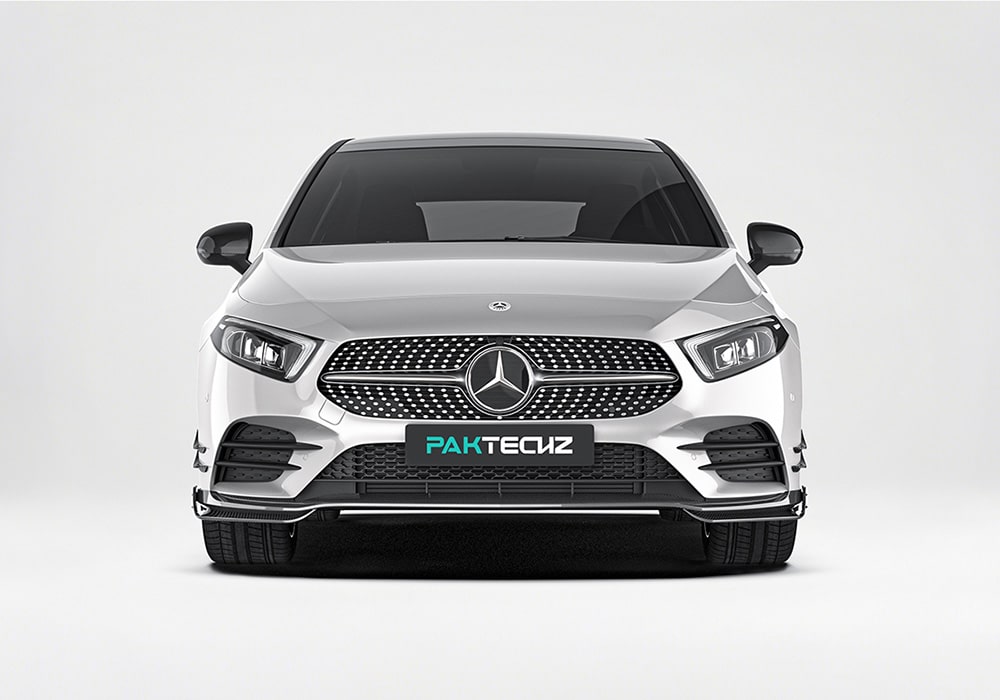 A detailed shot highlighting the bold carbon fiber front splitter, showing its aggressive styling and seamless fit with the factory bumper