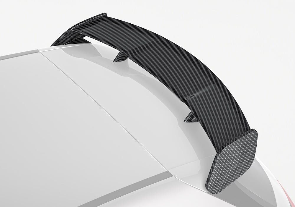 A detailed shot highlighting the 2x2 twill carbon fiber weave, complimented by a durable UV-resistant high-gloss finish for long-term brilliance
