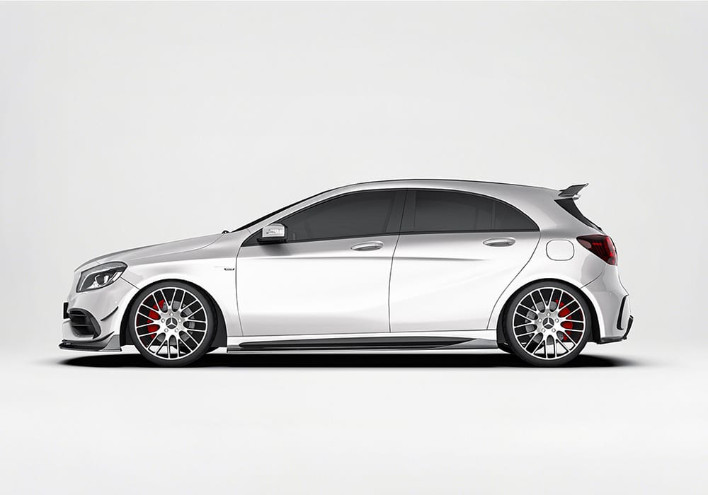 A close-up image of the front lip splitter, highlighting its aerodynamic shape, premium finish, and sharp race-inspired contours