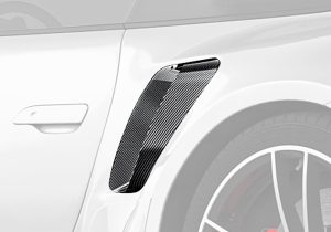 A detailed image showcasing the precise carbon fiber weave and high-gloss finish, emphasizing premium materials and craftsmanship
