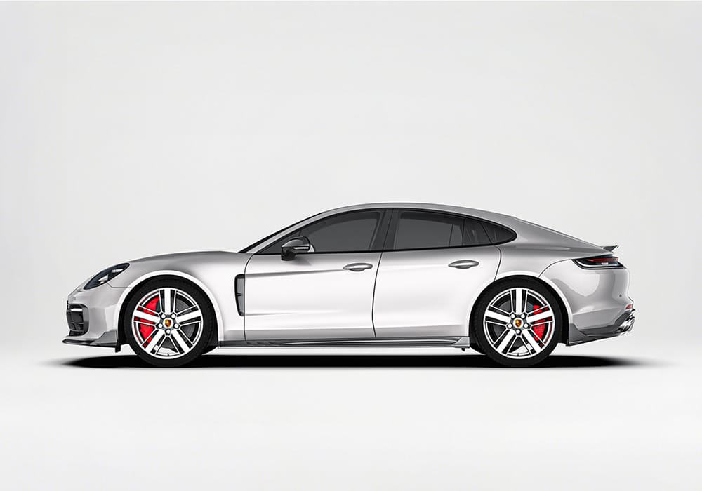 A detailed view showing the aerospace-grade carbon fiber front splitter, emphasizing its lightweight construction and glossy finish for durability and premium styling