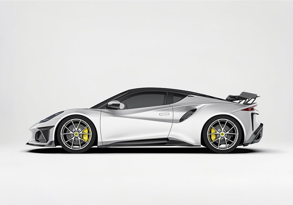 Aerospace-grade carbon fiber front splitter, precision-engineered to reduce front-end drag and improve cornering stability