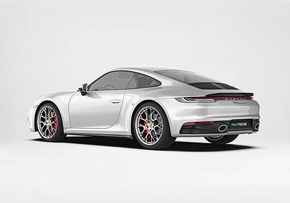A rear-profile shot featuring the Carbon Fiber Rear Diffuser and Wing Spoiler, demonstrating how the design elevates airflow and improves rear downforce