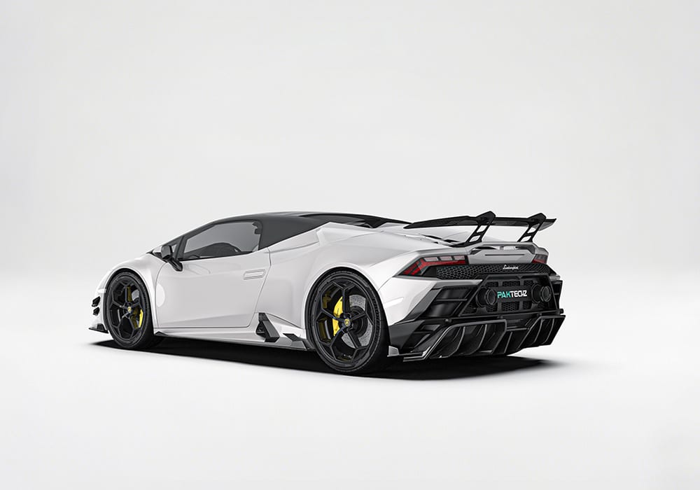 Rear-end perspective capturing the bold and aggressive presence of the race-inspired rear diffuser paired with the deck spoiler