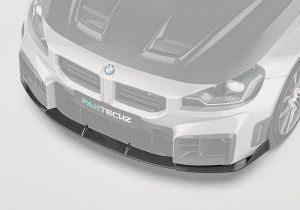 Performance-focused image demonstrating how the Carbon Fiber Front Lip enhances airflow and increases downforce during fast drives