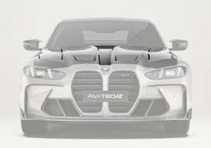 The hood's aerodynamic contours blending seamlessly with the sharp body lines of the BMW M3 G80, showcasing a sporty and aggressive appearance