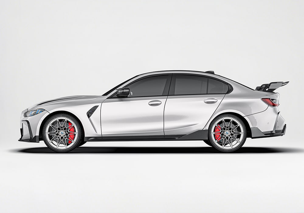 A close-angle shot of the carbon fiber side skirts, underlining their aerodynamic advantages and integrated design with the M4’s side profile