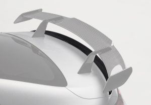 A side-angle image displaying the precise OEM-style fitment of the spoiler, blending perfectly with the CLE53’s rear trunk contours