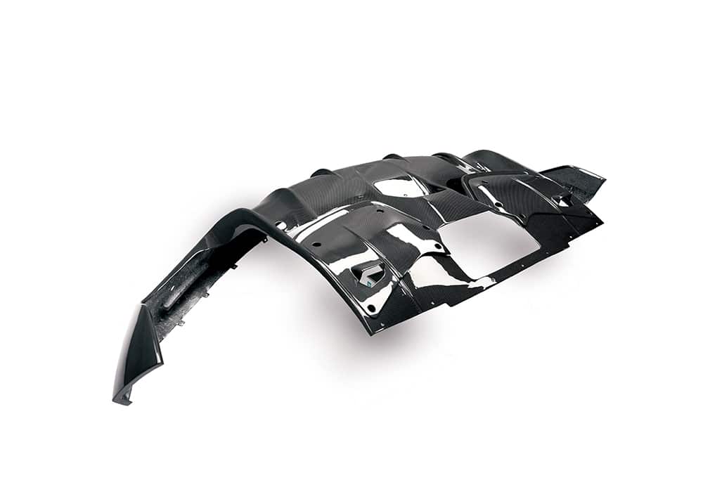 Angled view showing the Ferrari Purosangue exhaust surrounded by the sleek Carbon Fiber Rear Diffuser’s sculpted design