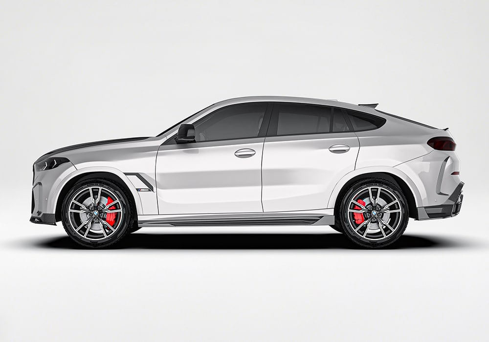 A dynamic view of the carbon fiber front splitter highlighting its aggressive design and aerodynamic functionality