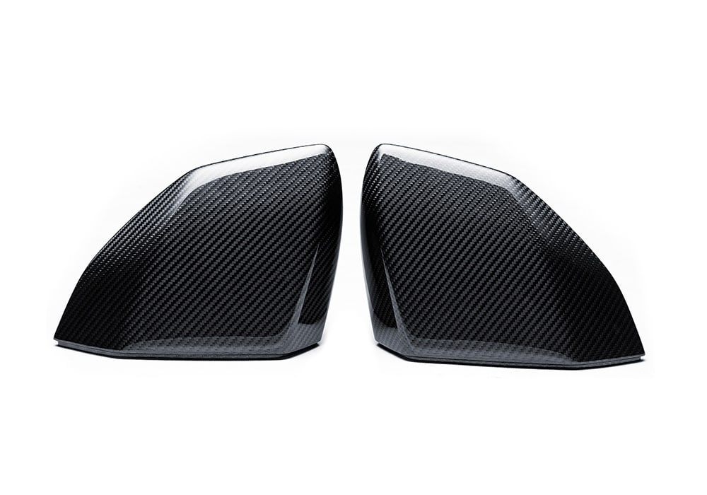 Angled side shot of Lamborghini Revuelto with Carbon Fiber Mirror Covers installed, emphasizing flawless fitment
