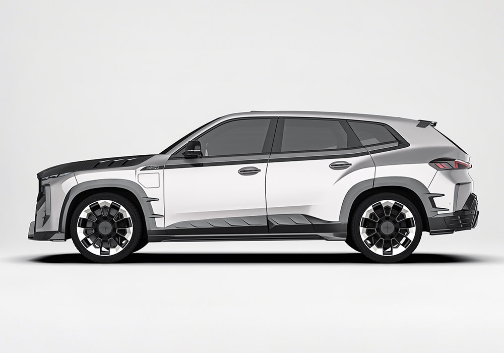 A side view emphasizing the extended carbon fiber side skirts that enhance the vehicle’s streamlined look and dynamic profile