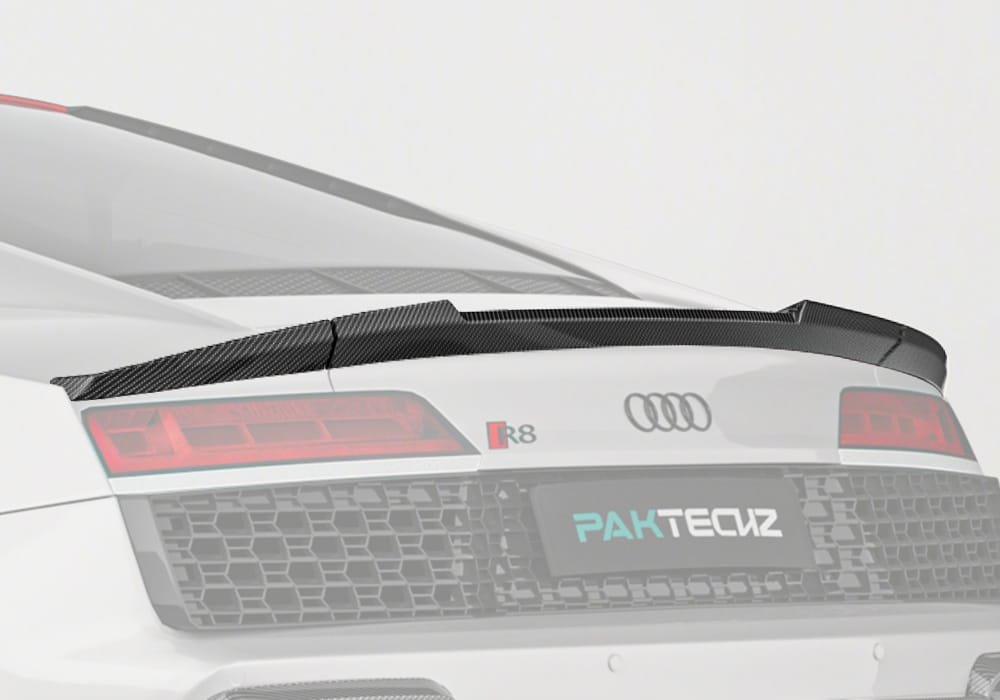 Step-by-step installation showing spoiler alignment with factory mounting points for secure attachment