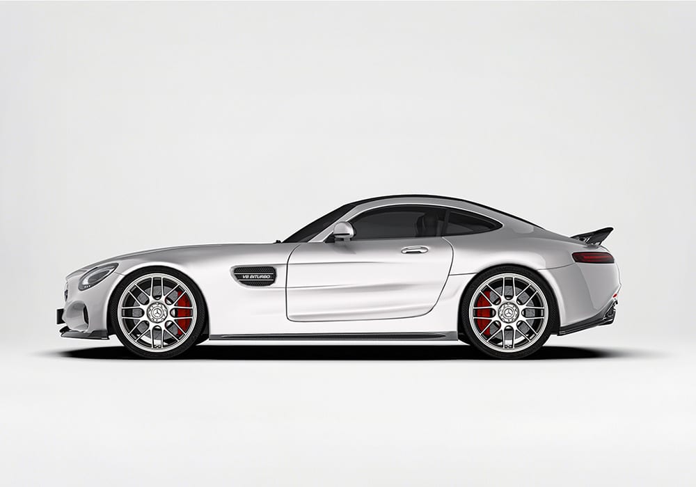 A clear rear angle image illustrating the Carbon Fiber Rear Diffuser and Rear Spoiler, highlighting their integration into the AMG’s sporty profile
