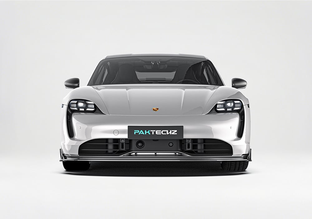 The full kit on a 2025 Porsche Taycan, captured during a high-speed performance test, emphasizing balance, cornering stability, and enhanced handling