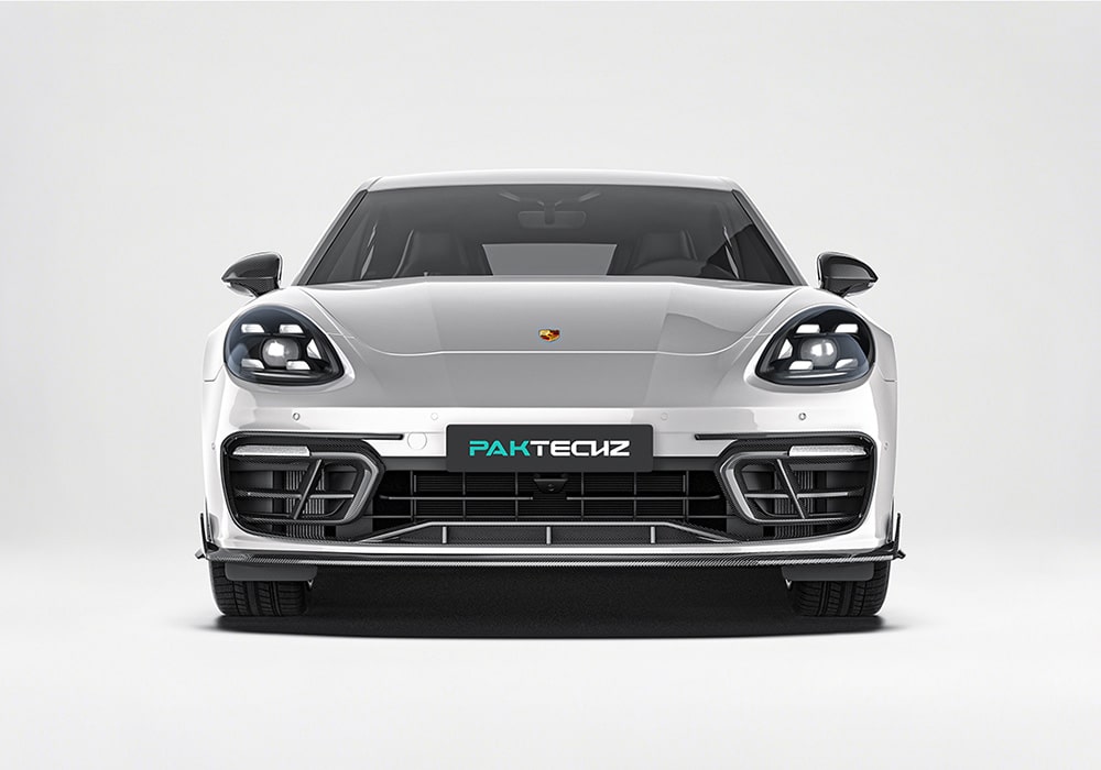 A rear-angle shot showing the Panamera with the carbon fiber rear diffuser in motion, highlighting dynamic airflow and improved handling at high speeds