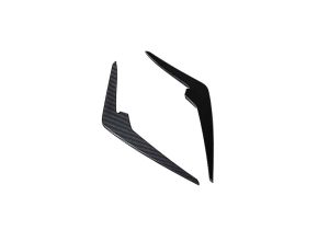 RS7 showing perfectly contoured front canards seamlessly blending with the aggressive lines of the bumper