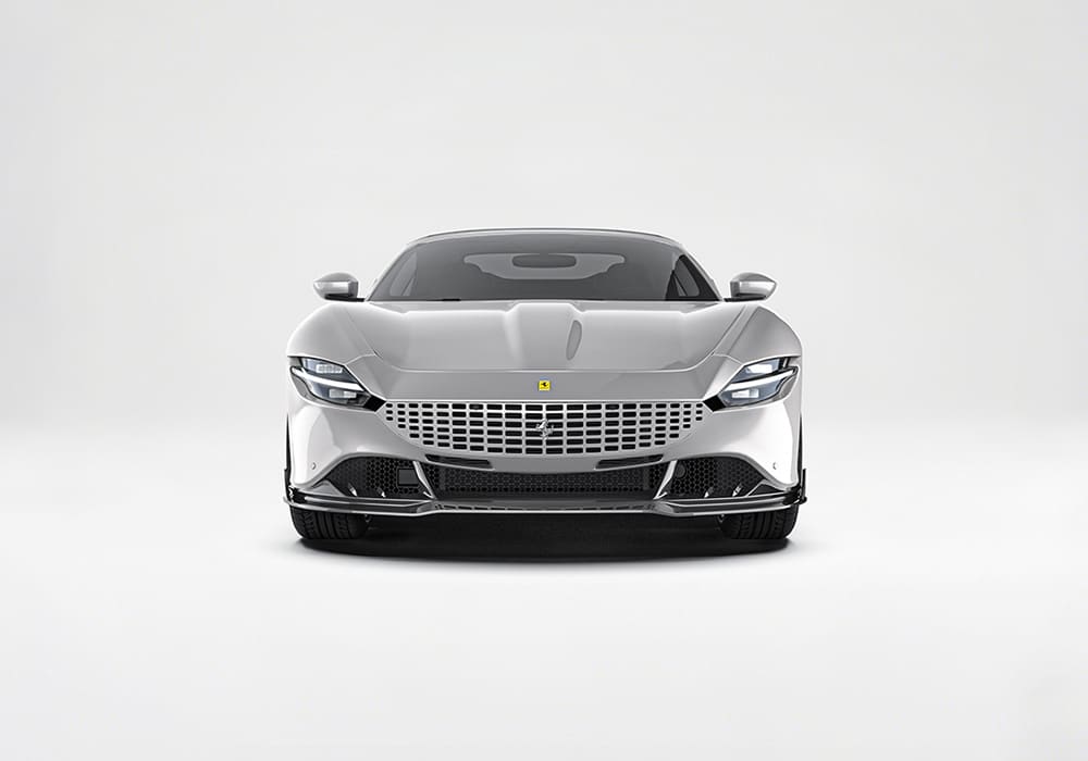Rear perspective emphasizing the diffuser and trunk spoiler, showcasing their aggressive yet refined styling impact