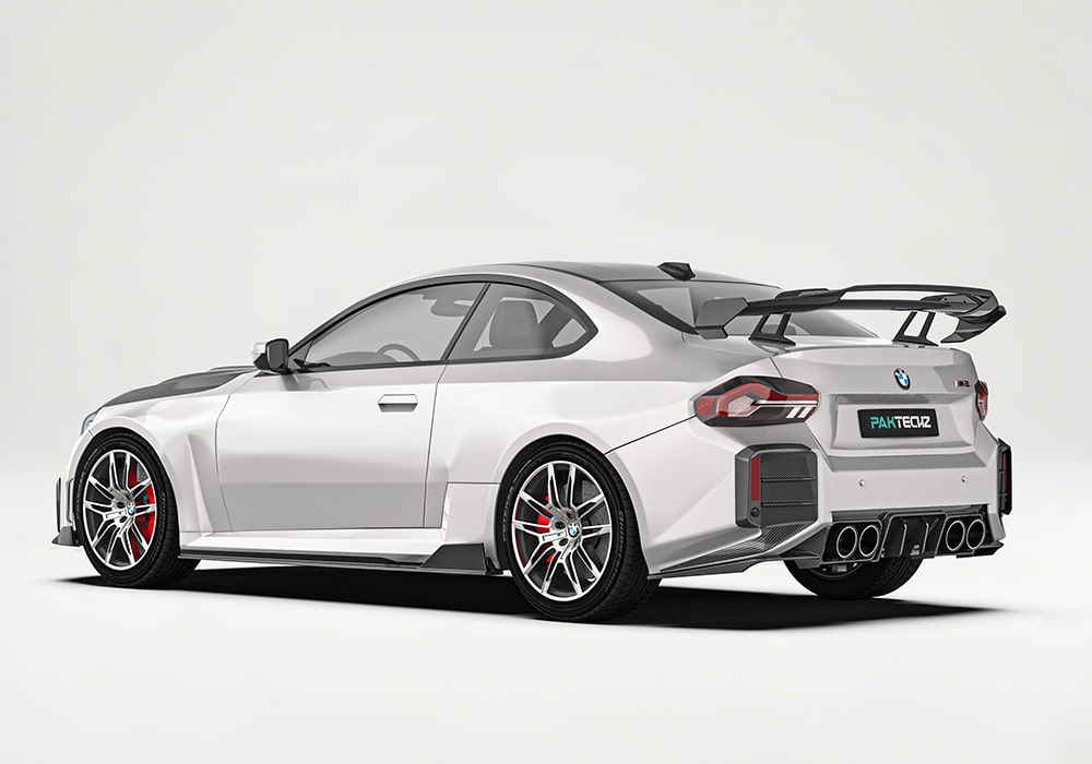 Side-angle view showing how the Carbon Fiber Side Skirts streamline airflow along the M2 G87’s sides for reduced drag and increased stability