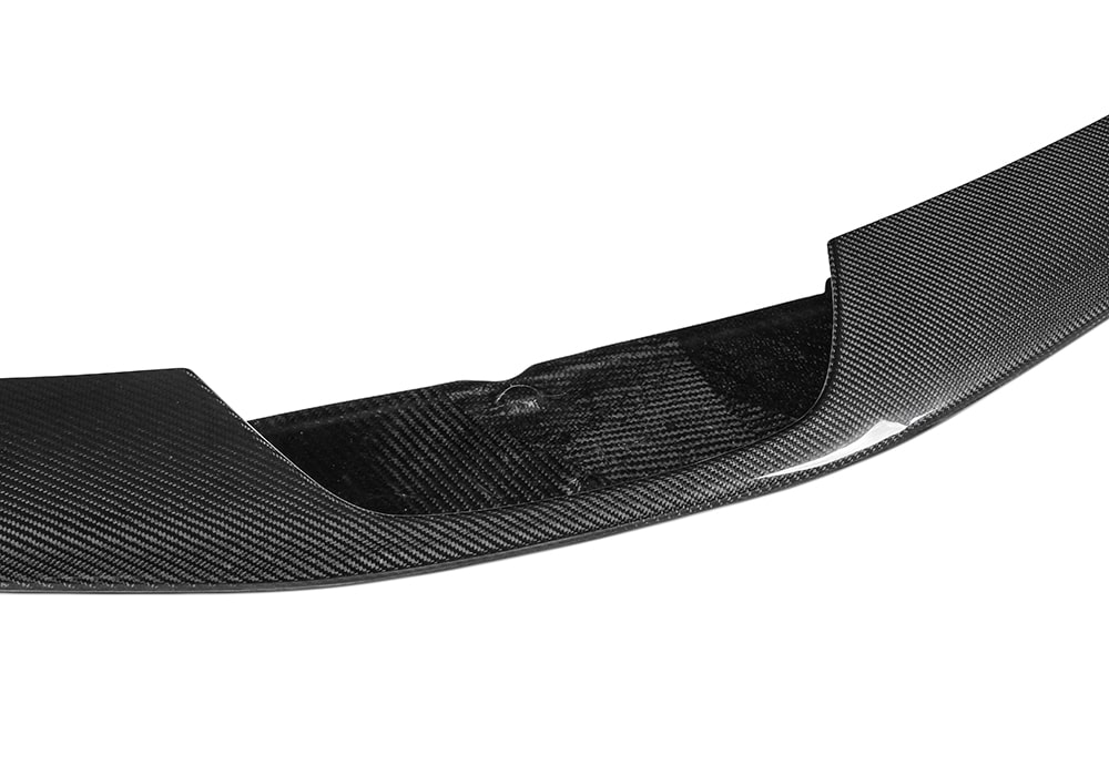 Studio photo of Ferrari SF90 Carbon Fiber Front Lip showcasing its aerodynamic profile