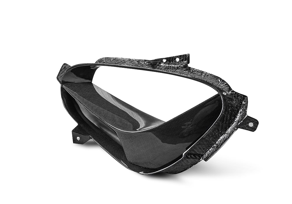 Studio image of Ferrari SF90 Carbon Fiber Side Air Intakes showing aerodynamic contours and precise craftsmanship