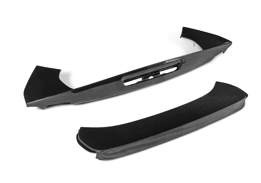 Ferrari SF90 Carbon Fiber Rear Spoiler displayed on a studio platform, emphasizing lightweight design and dynamic aerodynamics