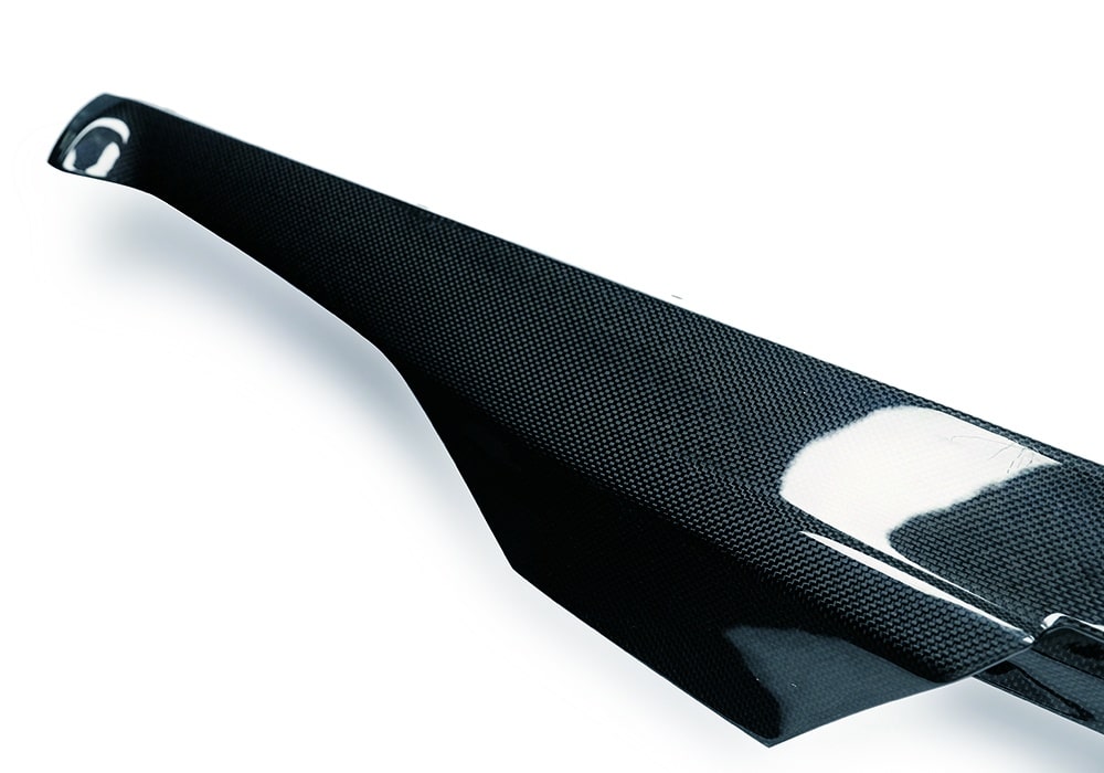 Studio image of Ferrari Purosangue Carbon Fiber Side Skirts highlighting their lightweight and aerodynamic design