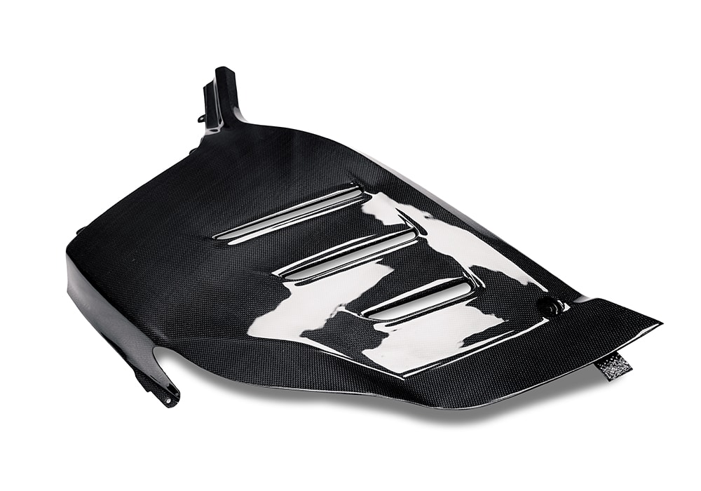 Studio shot of standalone Carbon Fiber Engine Bay Covers for Ferrari Purosangue with clear mounting points