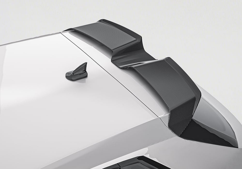 The carbon fiber rear diffuser fitted to Audi RS3, maximizing downforce and optimizing airflow management for high-speed stability