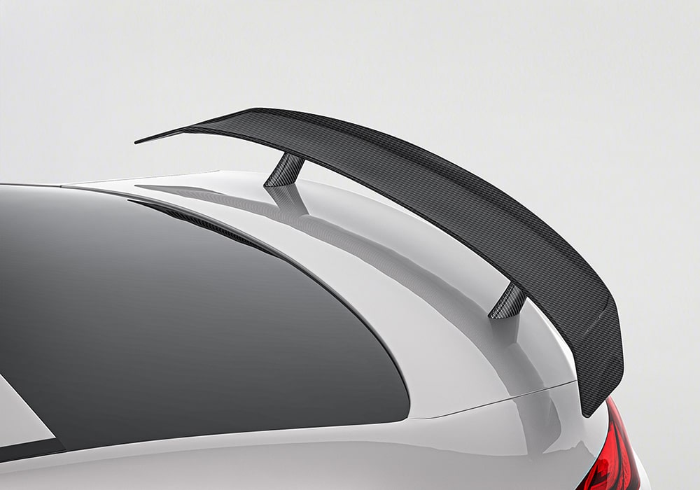 A visual representation comparing the stock look of the Mercedes CLA-Class W118/C118 versus the bold transformation with the installed Carbon Fiber Aerodynamics Kit