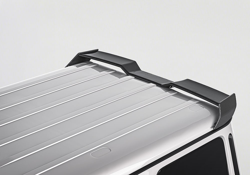 A dynamic image showcasing the Carbon Fiber Roof Spoiler in action on open terrain, displaying the balance of rugged off-road style and performance