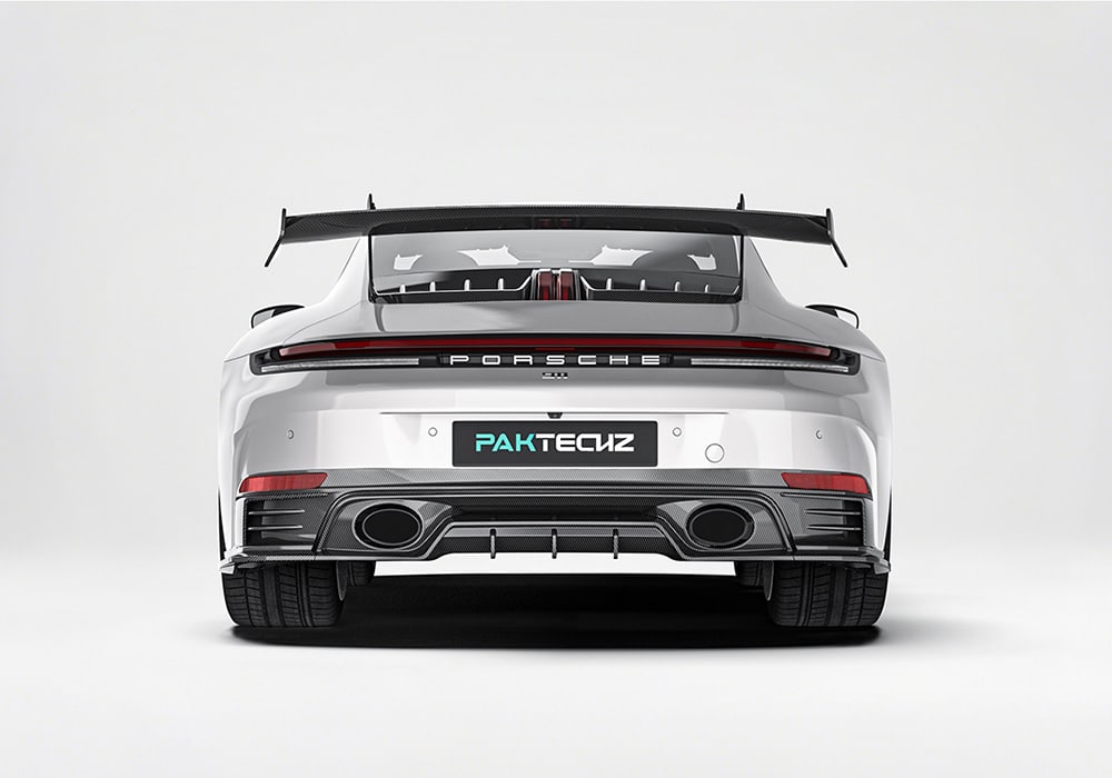 Side-by-side images showing the 911 992.2 without the kit versus its aggressive, modern styling equipped with the Carbon Fiber Aero Kit