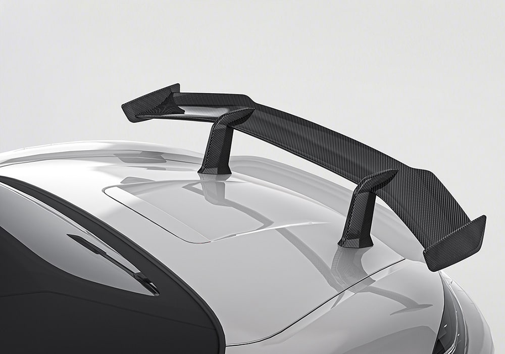 Image of the Porsche 718 in motion, focusing on how the Carbon Fiber Aero Kit enhances both performance and appearance dynamically