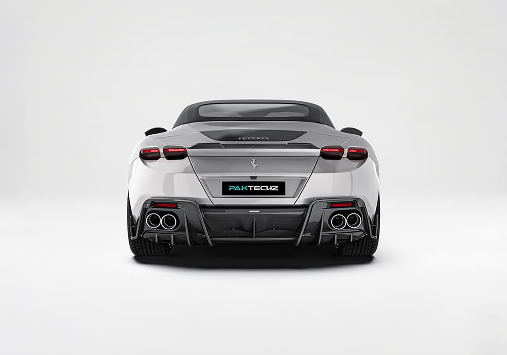 An image showing all components of the Carbon Fiber Aero Kit—front splitter, side skirts, rear diffuser, and spoiler—laid out to capture their sleek design