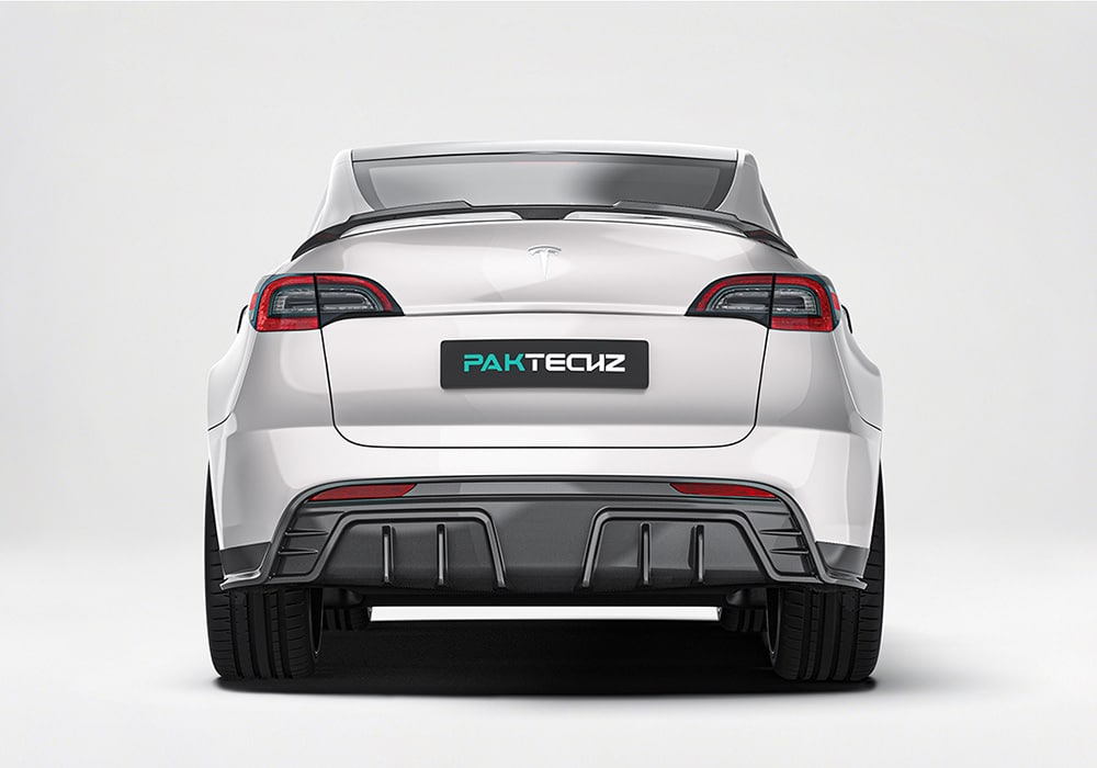 A rear view showing the spoiler amplifying the Tesla Model Y’s sporty look while improving high-speed stability and downforce