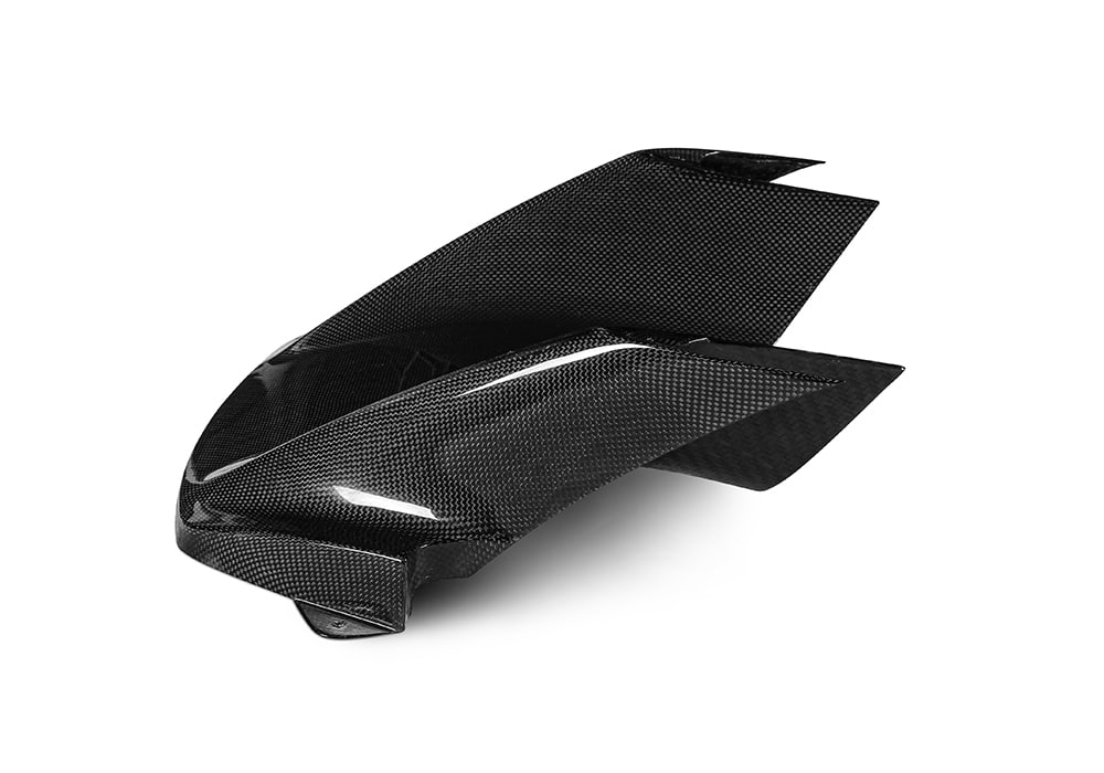 Ferrari SF90 racing on a track with Carbon Fiber Front Air Intakes optimizing airflow