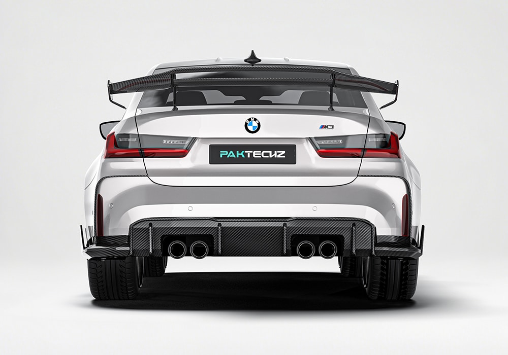 A focused close-up displaying the BMW M4 Carbon Fiber Trunk Spoiler, with its race-inspired contours and aerodynamic functionality