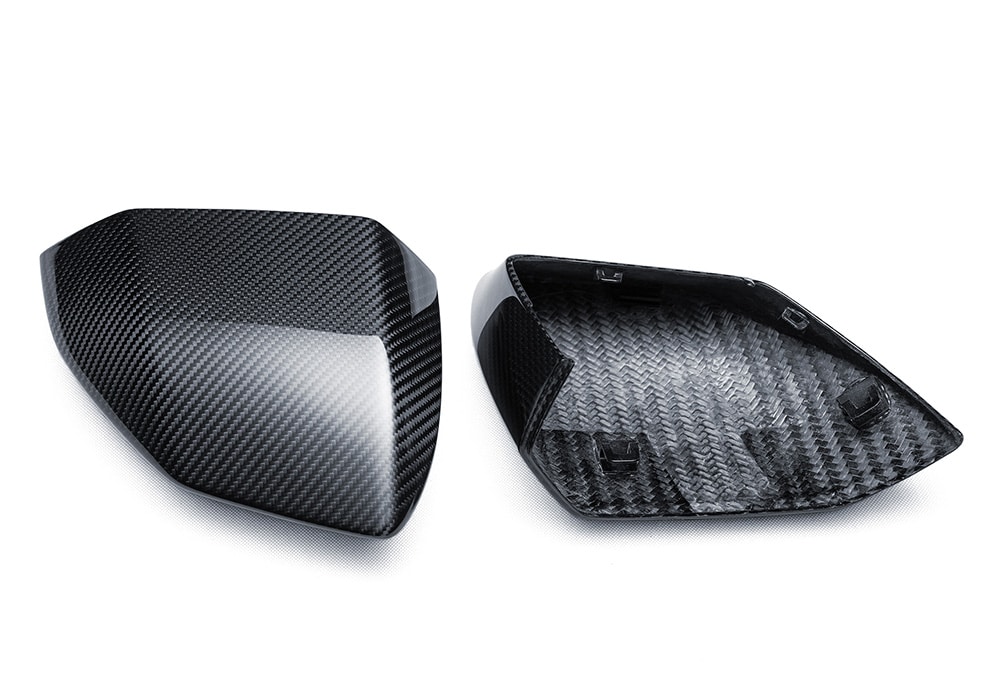 Side-by-side comparison of Lamborghini Revuelto stock mirrors and Carbon Fiber Mirror Cover upgrade