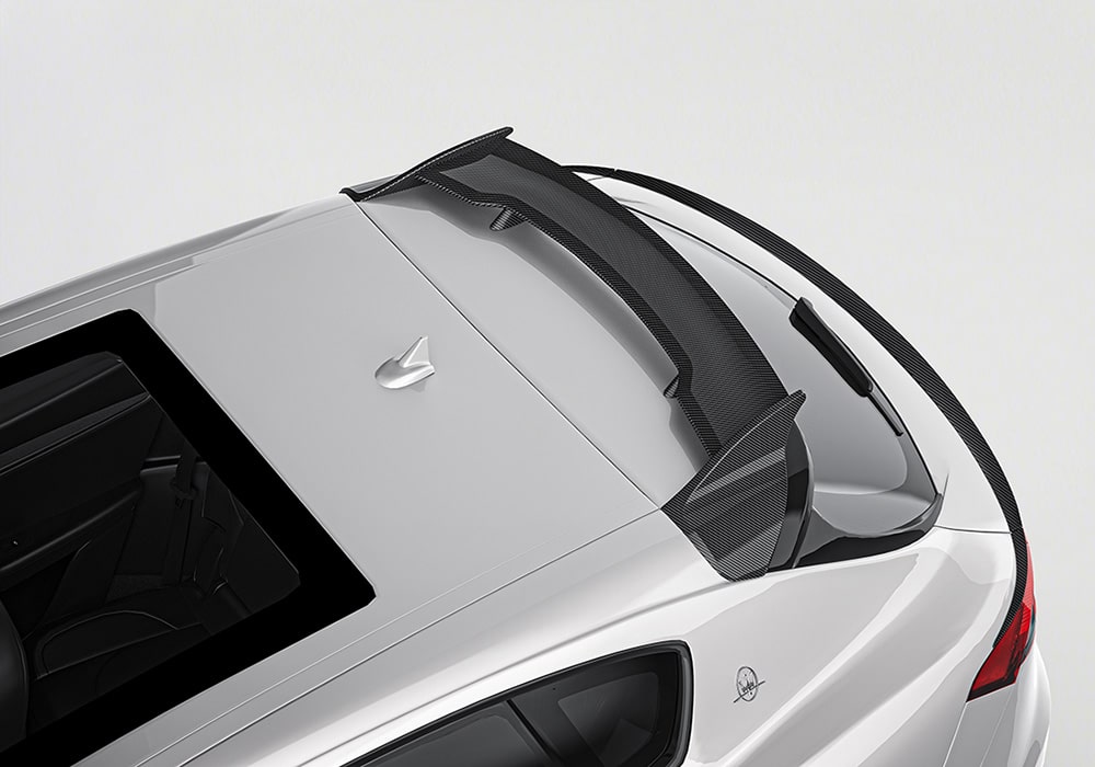 Split image showcasing the Maserati Levante in its stock form beside one with the Carbon Fiber Aerodynamics Kit, highlighting transformations in style and performance