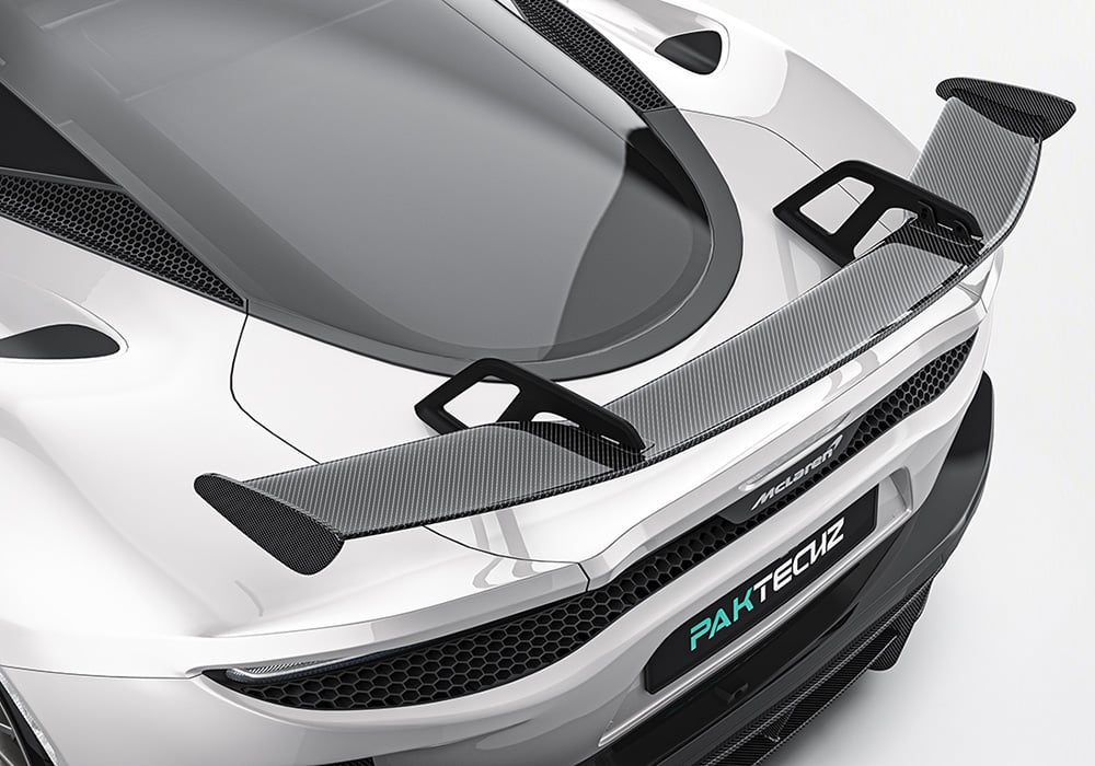 Wind-tunnel data visualization showing drag reduction and downforce improvements achieved by the body kit components