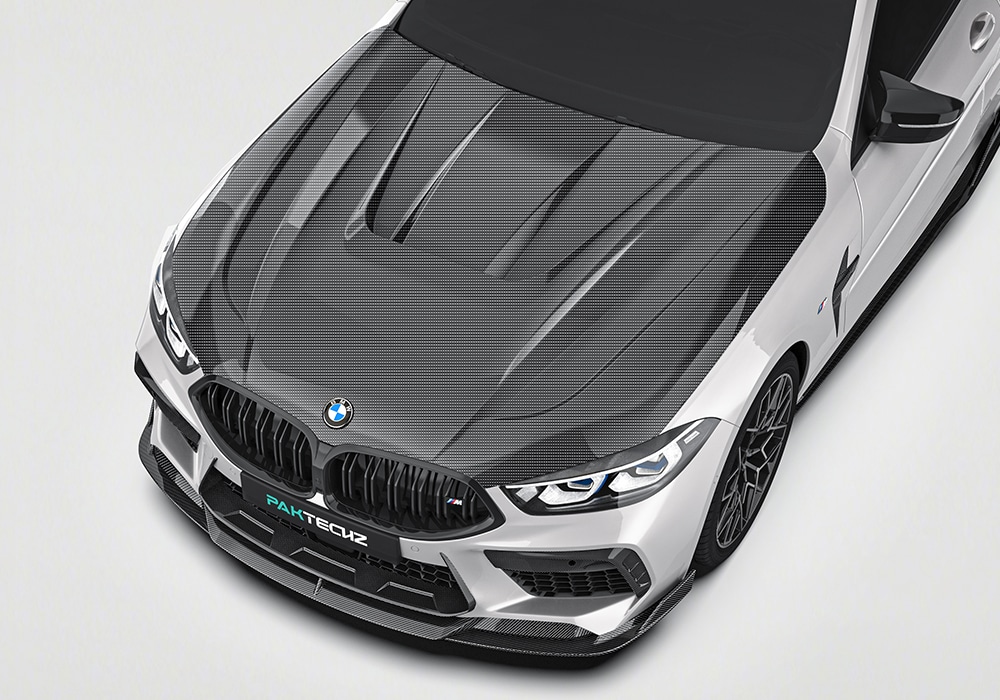 A side-angle photo emphasizing the seamless integration of the complete aerodynamic body kit—from the splitter to the diffuser and spoiler