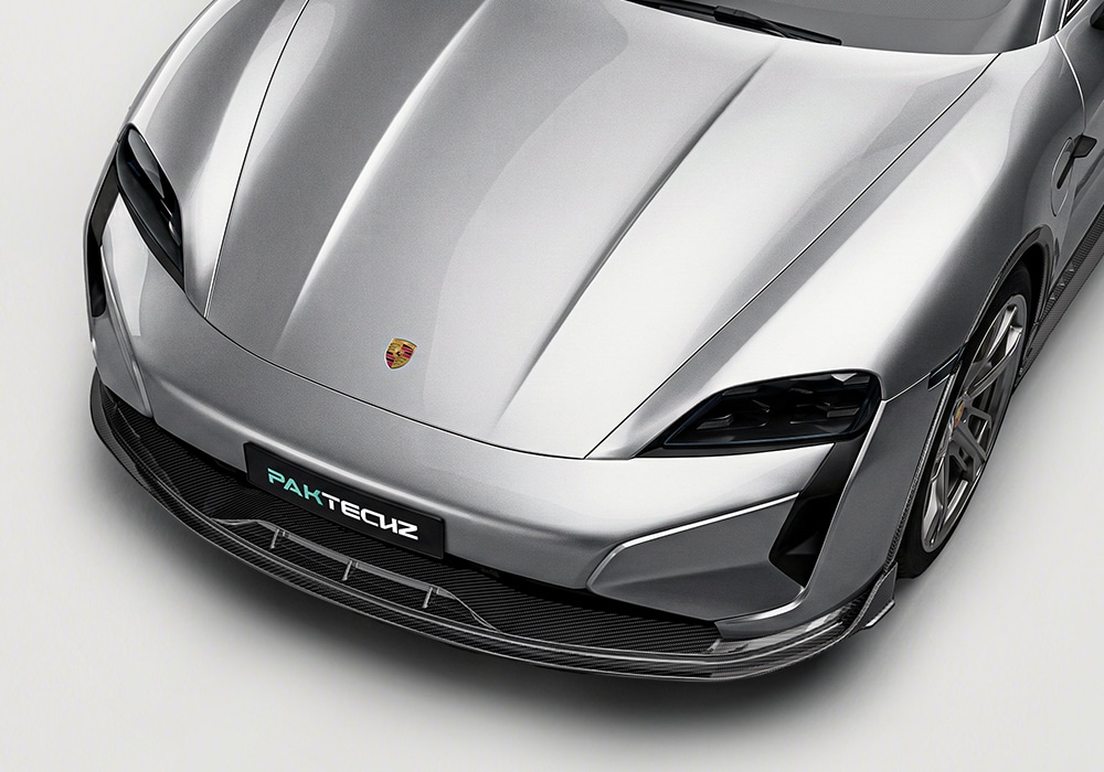 Close-up of Porsche Taycan Fender Flares in high-gloss carbon fiber for a bespoke finish
