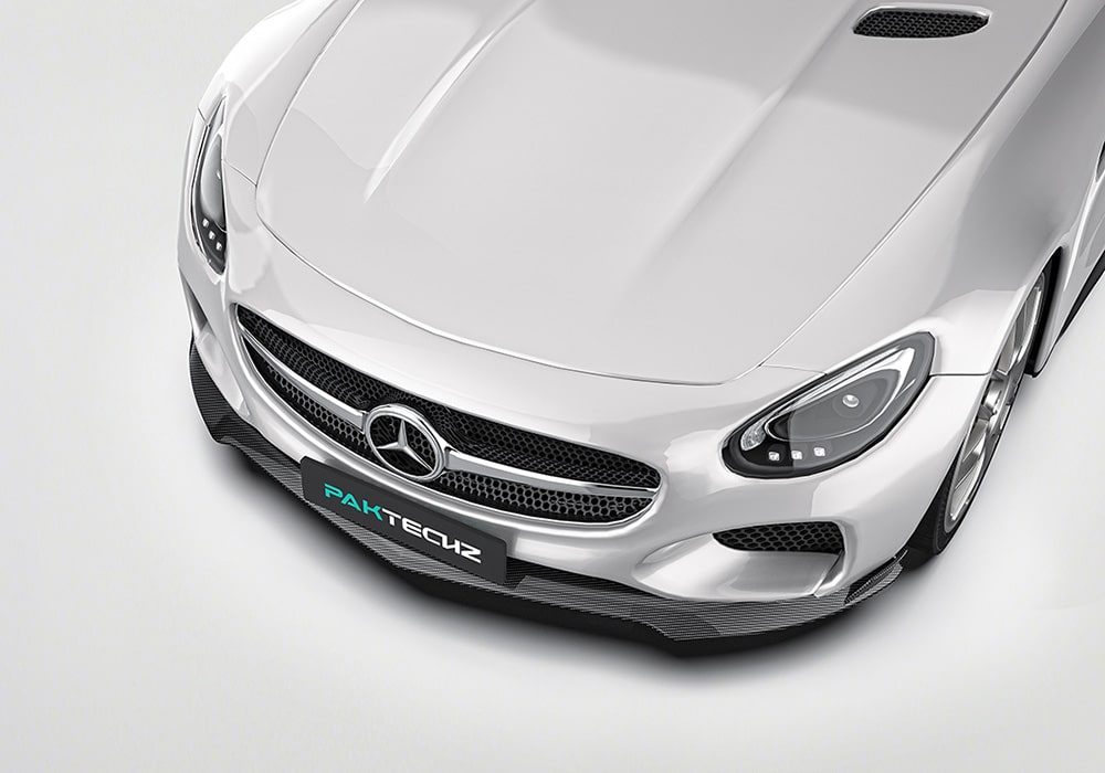 A frontal image showcasing the AMG GT/GTS C190’s aggressive look with the front lip, side skirts, rear diffuser, and spoiler installed, blending seamlessly into the car’s bold design