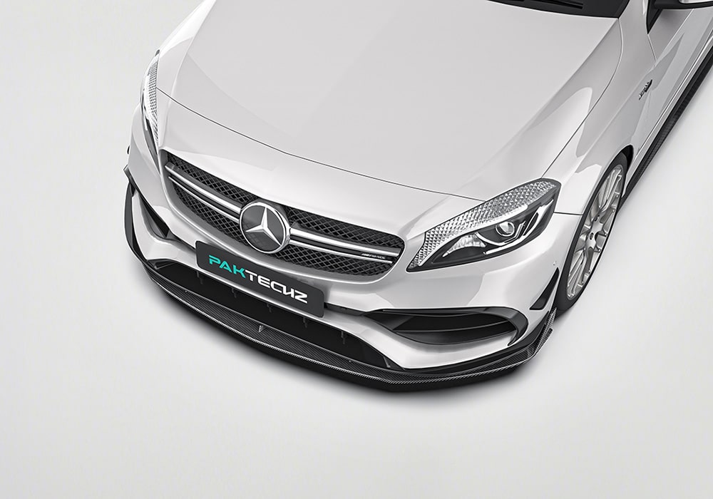 A full-side perspective of the Mercedes Benz A-Class (W176) displaying the streamlined design of the carbon fiber side skirts seamlessly integrated into the body